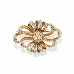 A 18k two-color gold and diamond brooch, circa 1950, (defects)