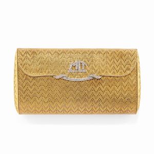 A 18k two-color gold and diamond bag