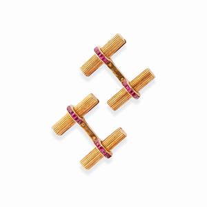 A 18k yellow gold and ruby pair of cufflinks, Cartier, with box