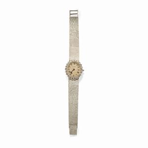 A 18k white gold and diamond lady's wristwatch, Piaget, defects