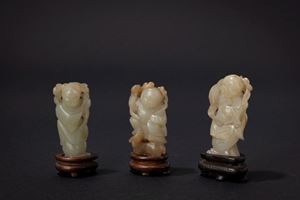 Three jade figures carvin. China, 19th c.