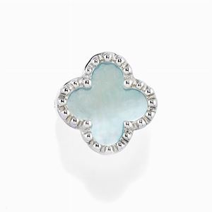A 18K white gold and mother-of-pearl blue ring