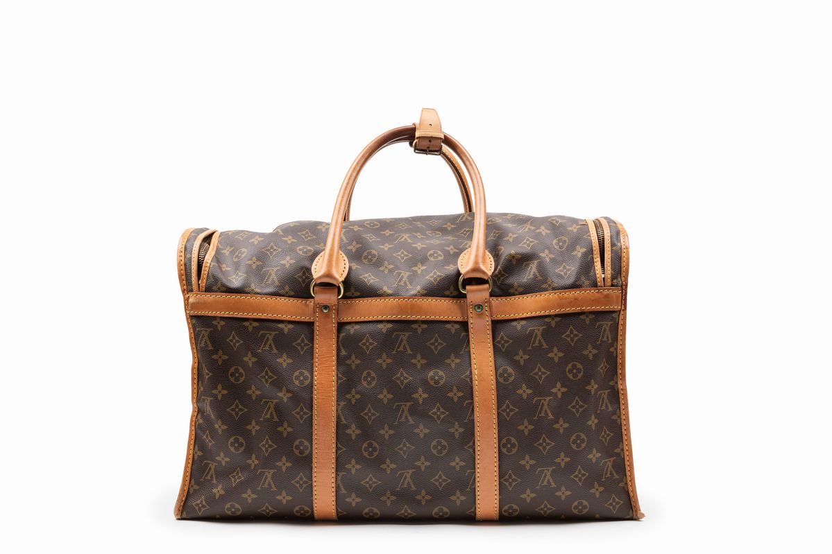 Louis Vuitton - Borsone da viaggio in tela monogram con profili in vacchetta, cm 54x24x35