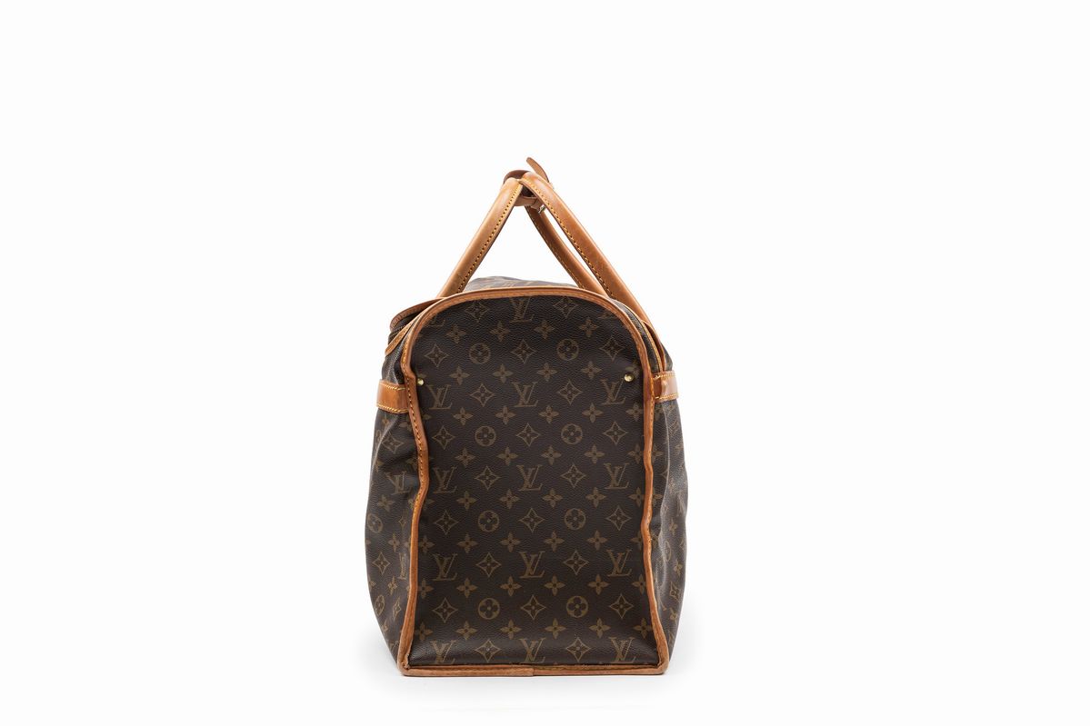 Louis Vuitton - Borsone da viaggio in tela monogram con profili in vacchetta, cm 54x24x35