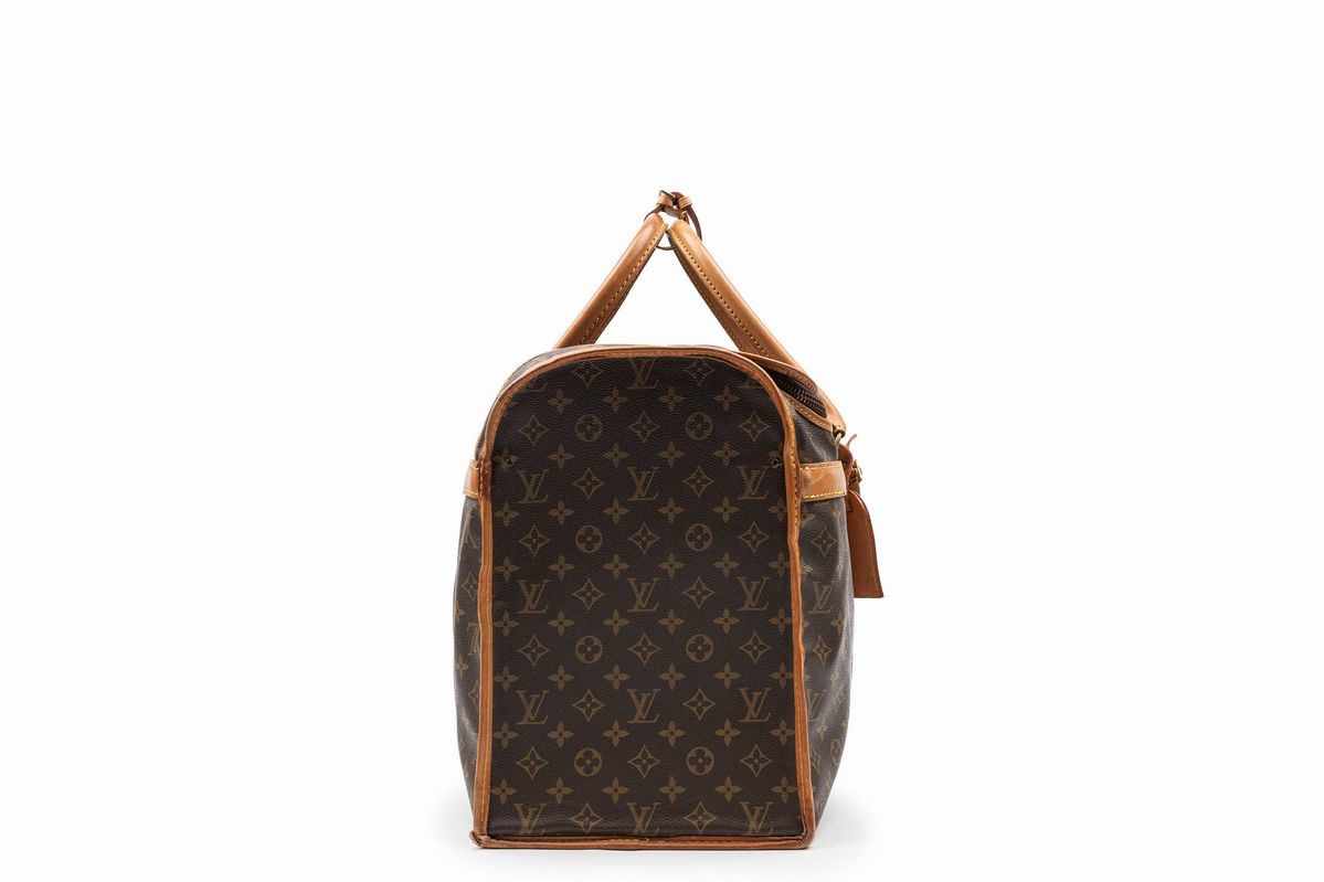 Louis Vuitton - Borsone da viaggio in tela monogram con profili in vacchetta, cm 54x24x35