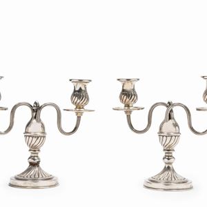A couple of silver candlesticks, Italy 20th Century, Miracoli