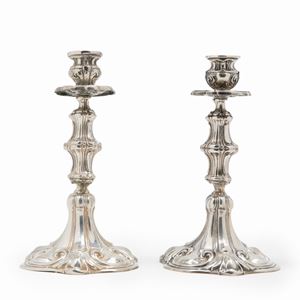 A couple of silver candelstick, Italy early 20th Century, defects