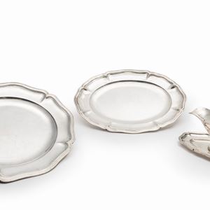 Two silver plates and a gravy bowl, 20th Century
