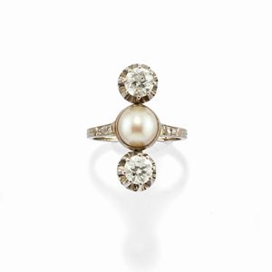 A 18k white gold, diamond and cultured pearl ring, circa 1930