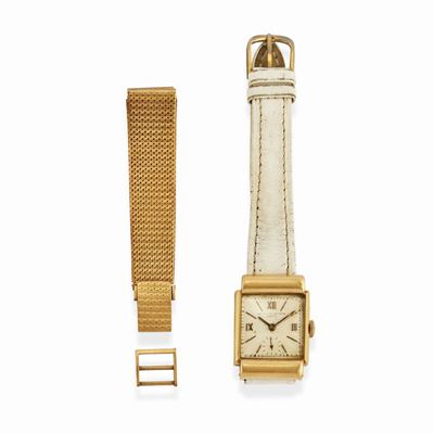 Orologio in oro giallo 18k, quadrante chiaro con numeri romani