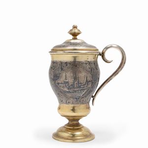 A silver-gilt and nielloed cup and cover, Moscow 1863