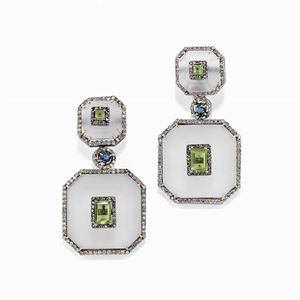 A silver, crystal rock, peridot, topaz and diamond pendant earrings