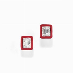 A 18K white gold, red enamel and diamond earclip
