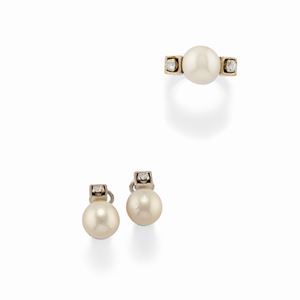 A 18k white gold, cultured pearl and diamond demi parure
