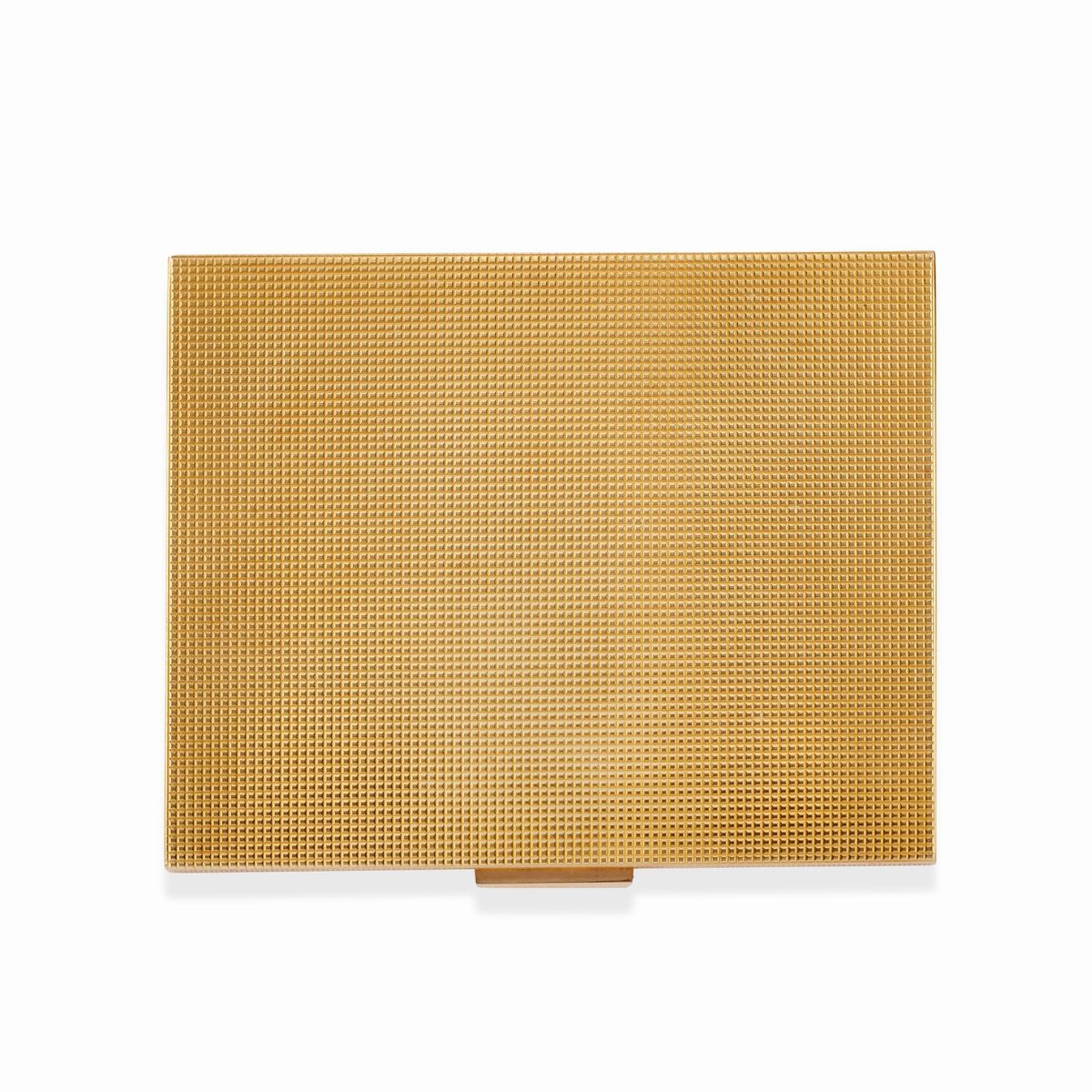Tre porta sigarette e una scatola in oro giallo 18k
