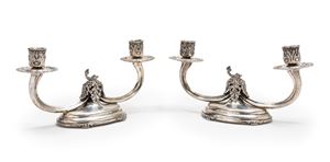 A couple of silver candelbra, Italy 20th Century