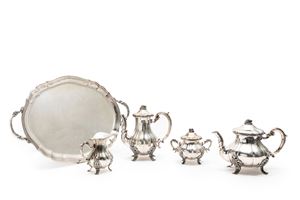 A silver tea and coffe service with tray