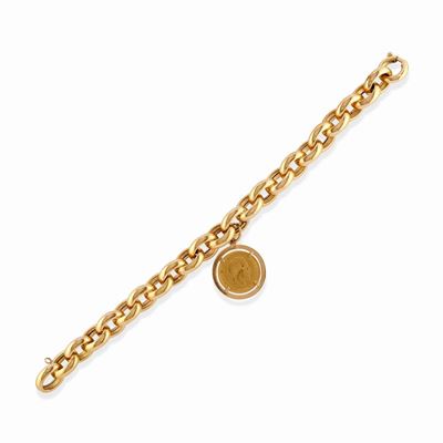 Bracciale in oro giallo 18k con pendente e moneta da 10 Franchi
