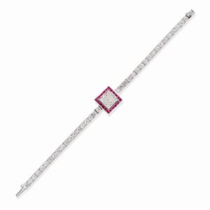 A 18k white gold, diamond and ruby wristwatch, Omega