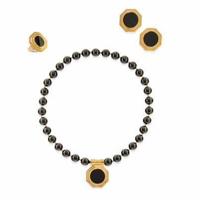 Parure in oro giallo 18k con onice