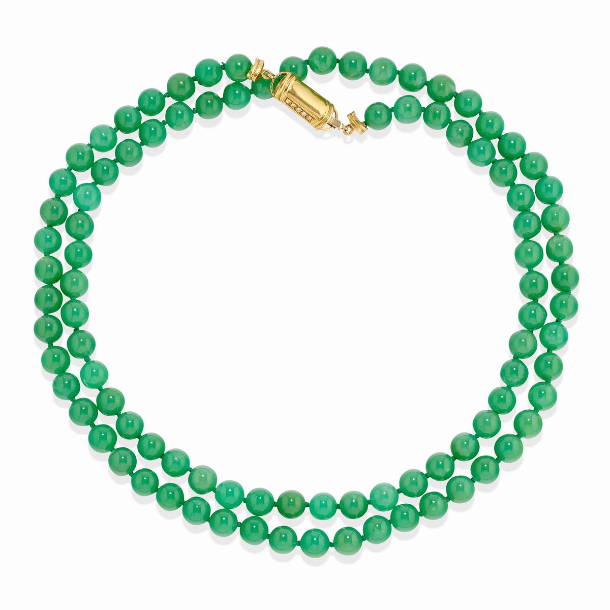 Due gioielli in oro giallo 18k con pietre verdi di giada giadeite