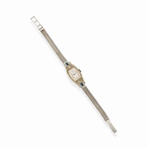 A 18k yellow gold, diamond and blue gemstone wristwatch, Geneve