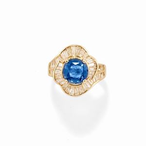 A 18k yellow gold, sapphire and diamond ring