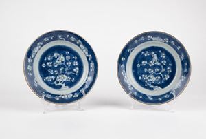 A pair of blue and white "prunus" plates. China, 18th c.