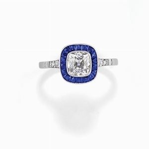  - Anello con diamante e zaffiri