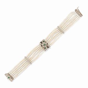 A 18k white gold, cultured pearl, emerald, diamond and enamel bracelet