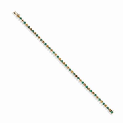 Bracciale tennis in oro bianco 14k con smeraldi e diamanti fancy yellow